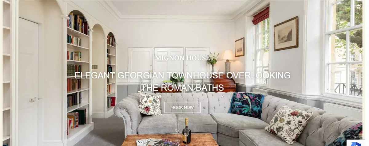 Mignon House website hero showing the living room interior